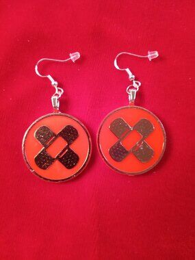Burned Pokemon bandages coin hook earrings